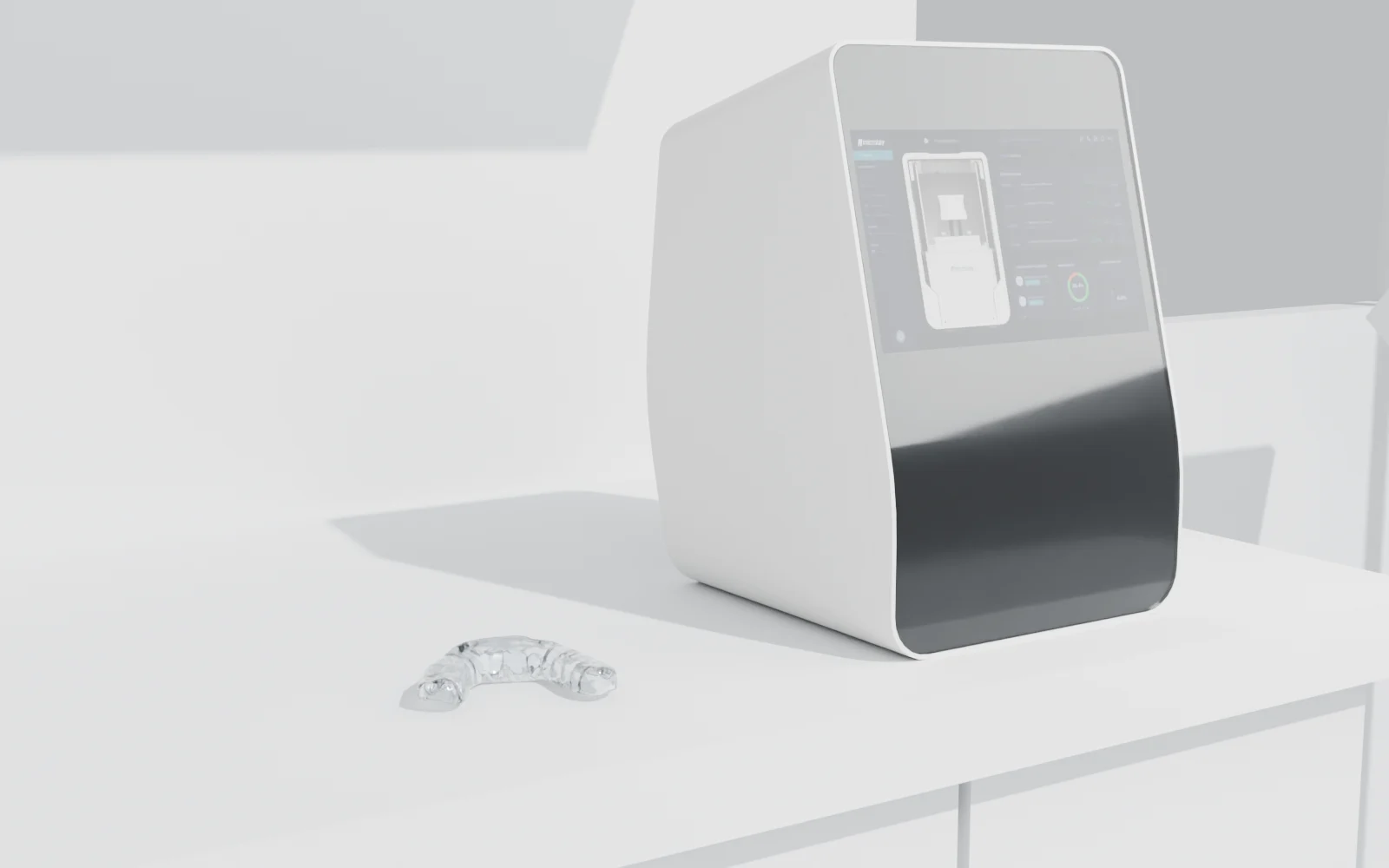 Microlay Ivy en la encimera, con una férula transparente recién terminada al lado